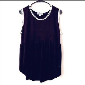 Black peplum tank with cream knit border